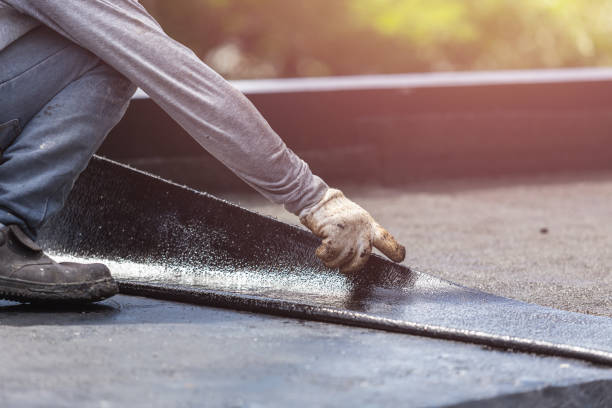 Professional Waterproofing technician working in Oxford, NC